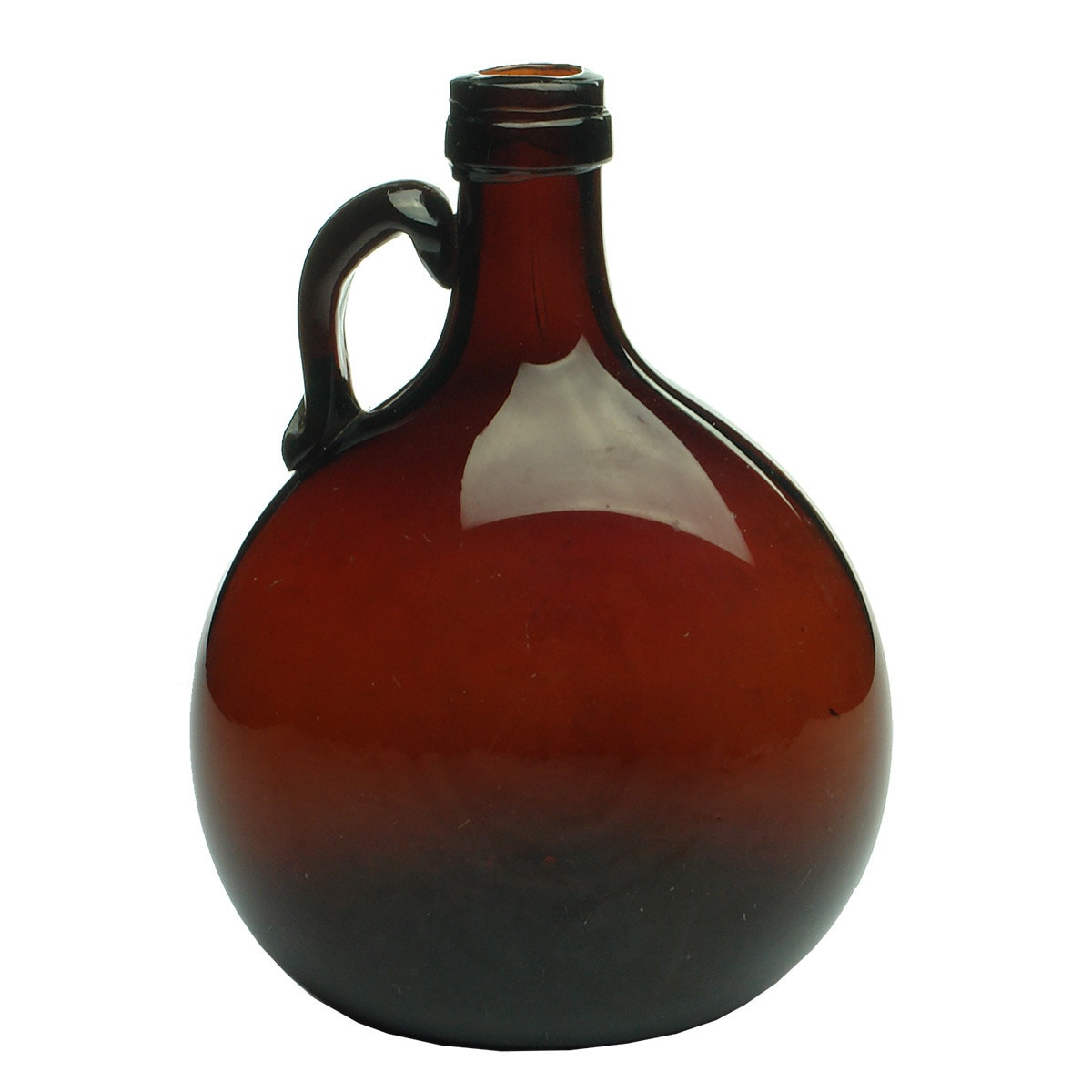 Red amber handled Chestnut style wine or spirit bottle.