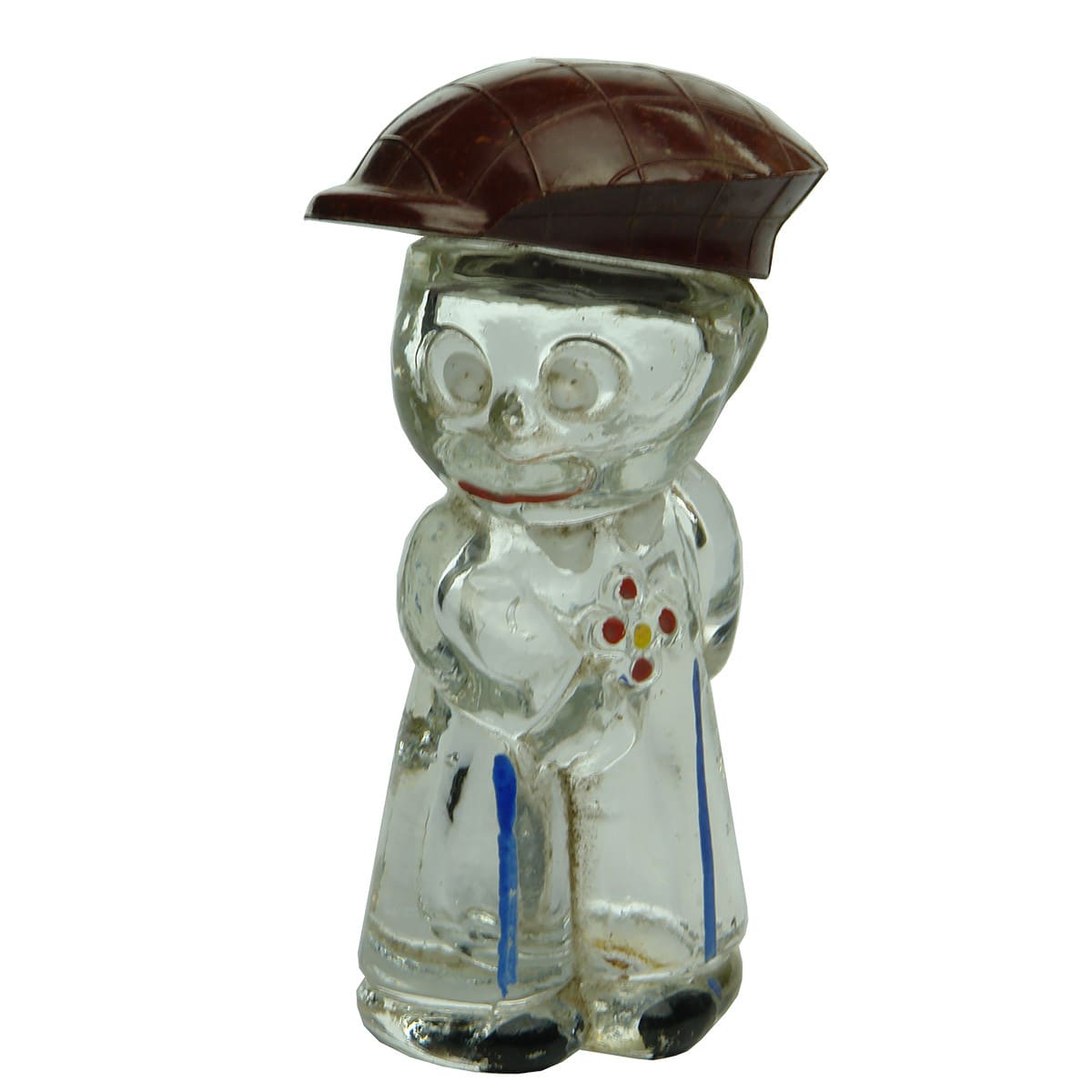 Figural Lolly or Hundreds & Thousands bottle. Little boy holding flowers. Bakelite cap in the shape of a cap! Enamel decoration.