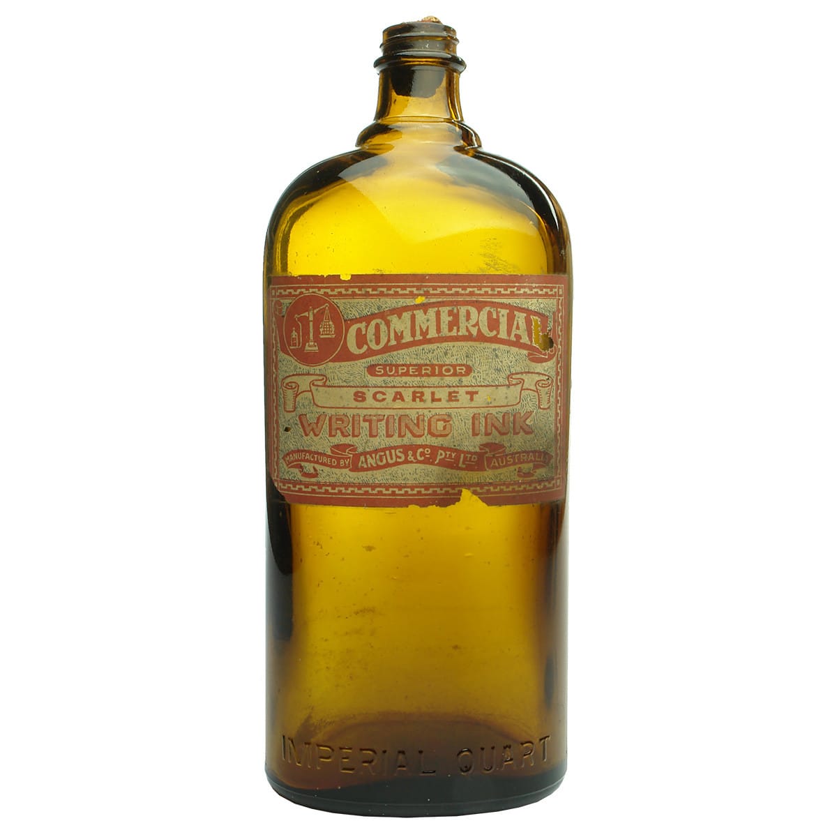 Ink. Large amber quart bottle with label for Angus & Co Pty Ltd Commercial Scarlet Writing Ink.