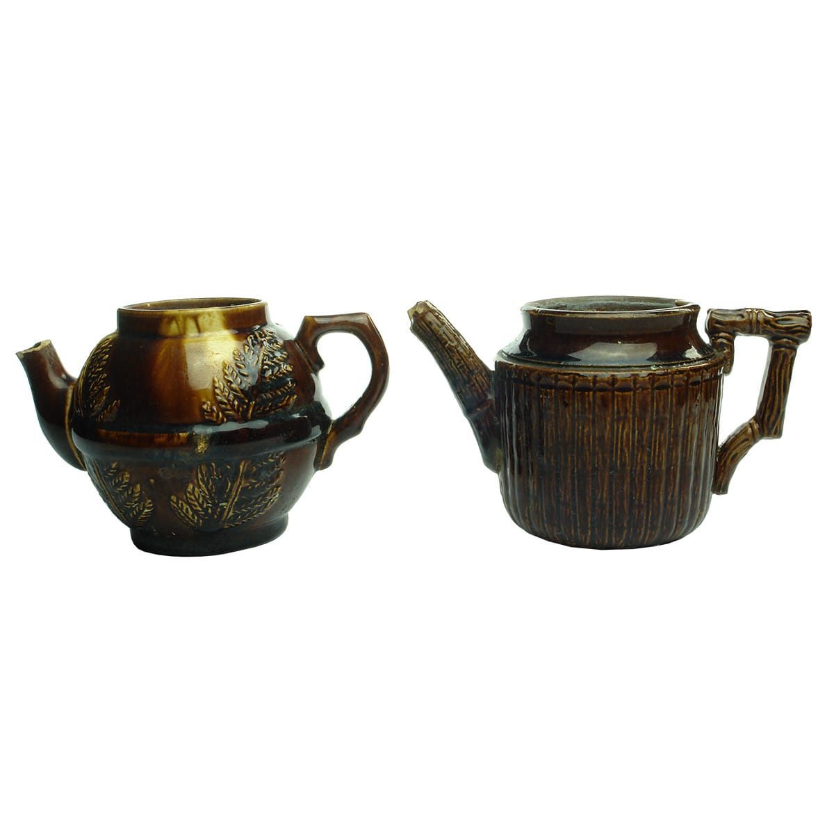 2 Teapots. Fern pattern and Bamboo pattern. Rockingham Glaze. Both about 1 - 2 cup size.