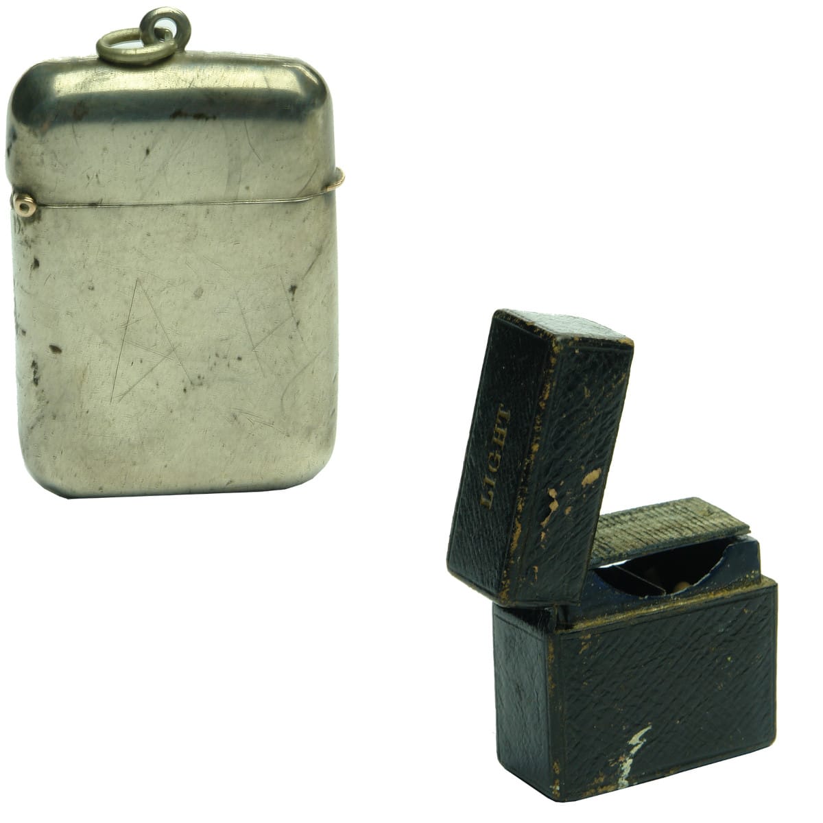 Tobacciana. Silver Vesta Case and a Leather Bound Vesta Case.