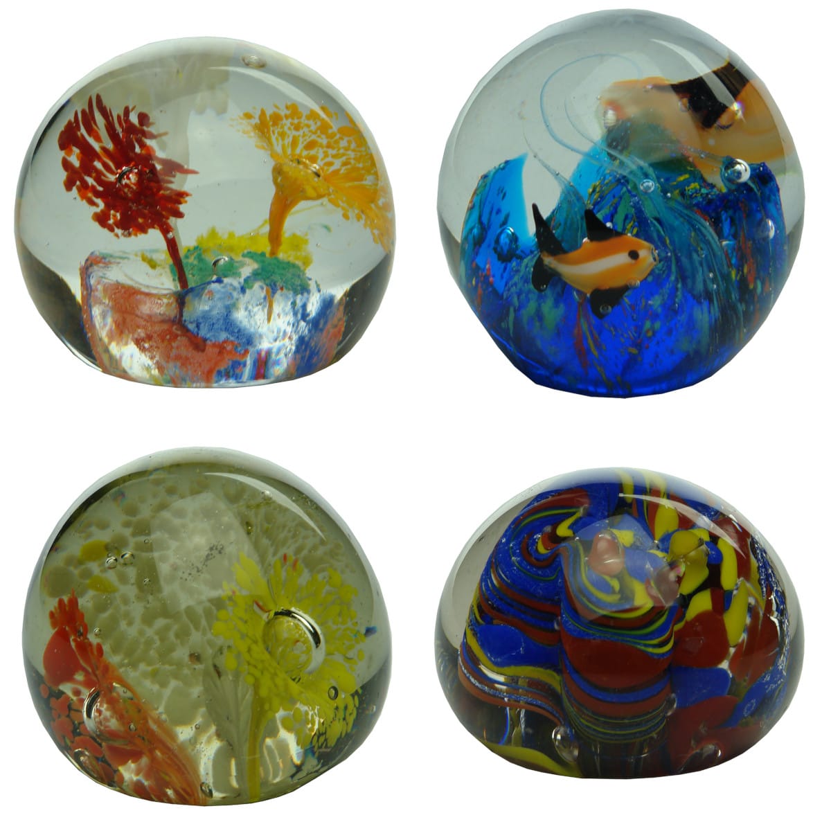4 Glass Paperweights. Multiple bright colours, ground base; Pair of Fish, Abacus Imports; Orange, Yellow & White; Blue, Yellow & Red.