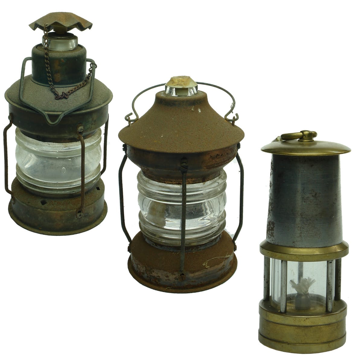 3 Lamps. 2 x Heavy glass bottle. Tin and copper; Small but very heavy brass and steel hanging lamp.