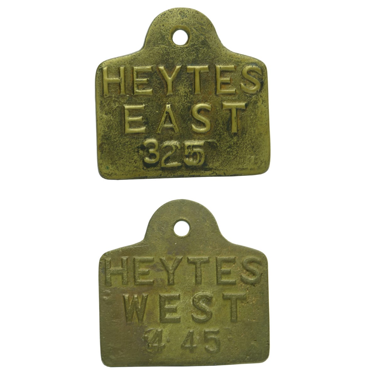 Pair of Brass Cow Tags. Heytes East & West. 325 & 445. (Heytesbury, Victoria)