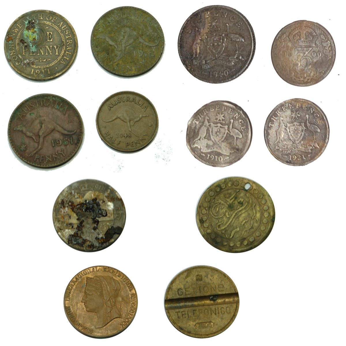 12 Numismatic items: 9 Coins; Medallion; Thin copper disc and a Gettone Phone token.