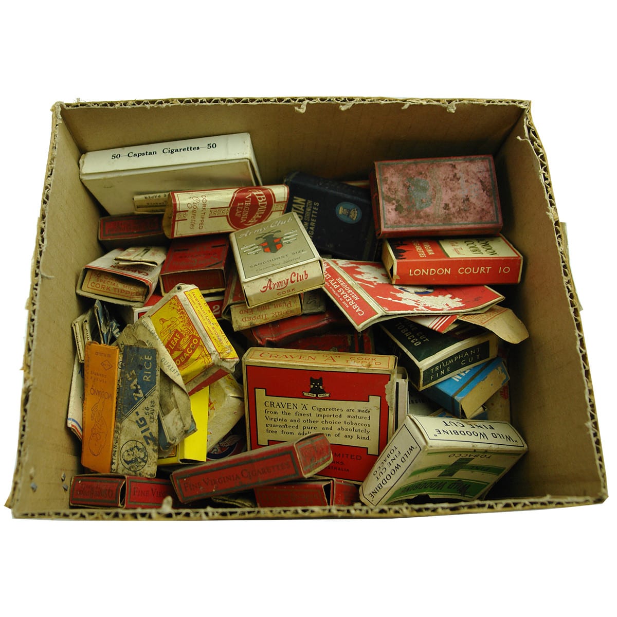 Big box of Cardboard Cigarette Packets and cigarette papers. Nice big range with some early ones.