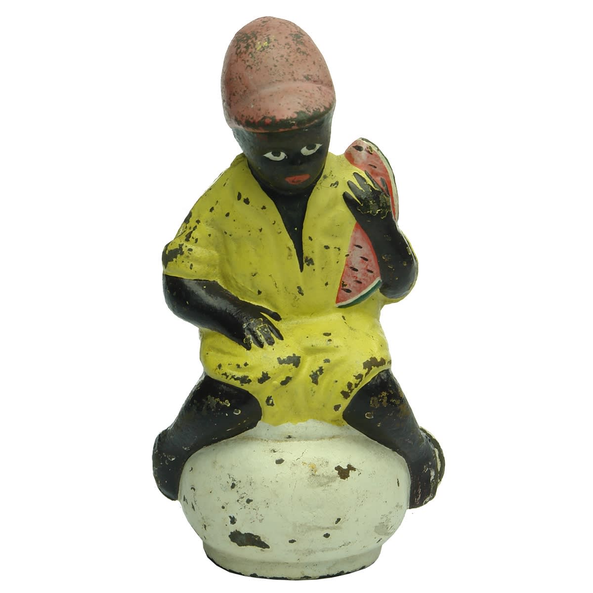 Money Box. Boy sitting going to the toilet on a pot and also with watermelon in hand. Cast Iron.