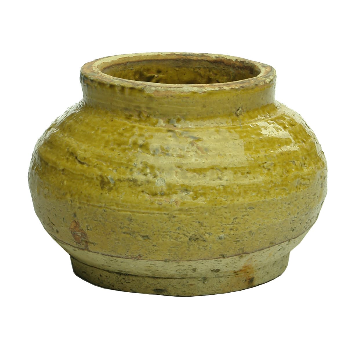 Asian Pottery. Yellow glazed top with unglazed lower half. Small squat pot.