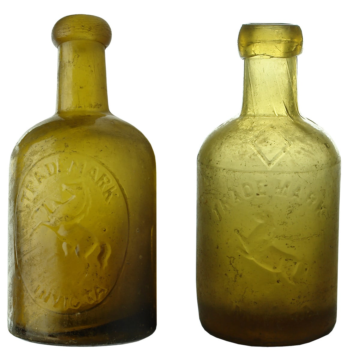 Pair of Dump Sodas. Both different Wm Culverhouse & Co, London. Established 1808. Invicta. Honey Amber.