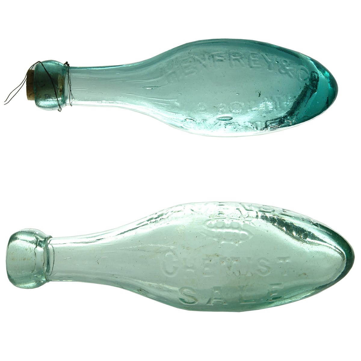 2 Torpedos. Henfrey & Co, Sydney Wovenden Chemist Sale. Aqua. 6 oz. (New South Wales, United Kingdom)