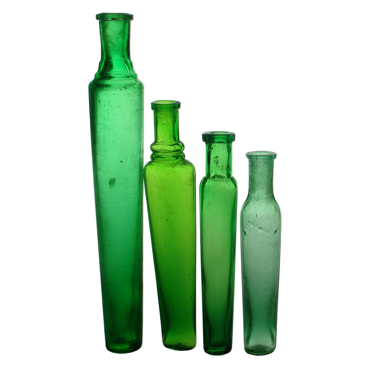 Perfume. Four different green lavendar water bottles.