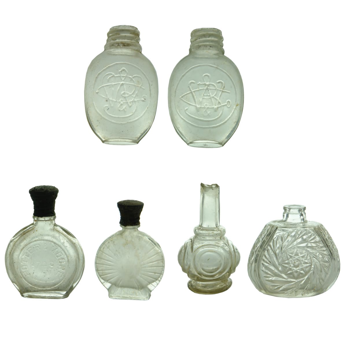 Perfume. Six Perfume/Tabloid bottles: 2 x Burroughs Wellcome & Co Tabloid Bottles; Potter & Moore Perfume; Sunburst Perfume; Round Genie Type Bottle with Pontil; Perfume with Star to Mid Body.