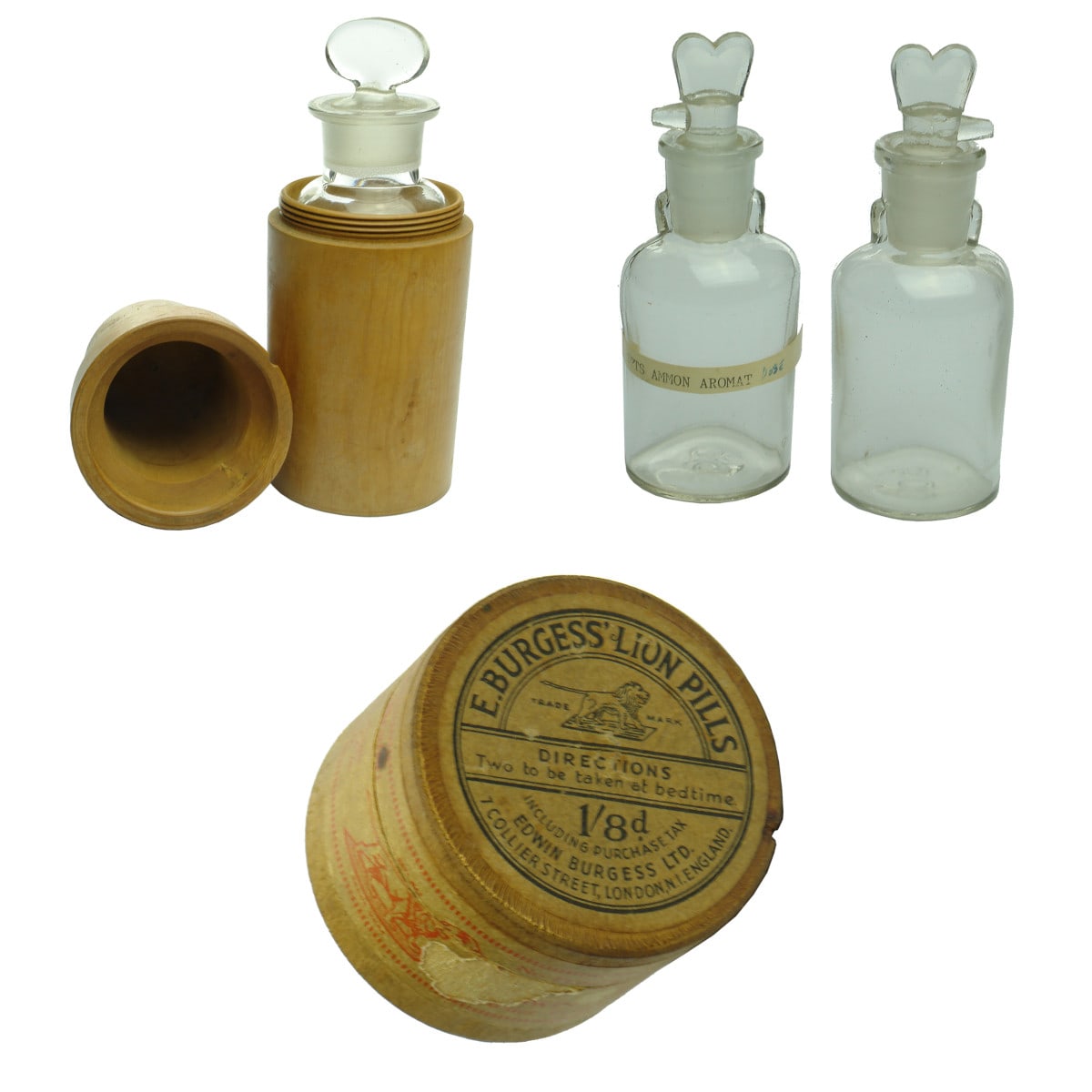 4 Pharmacy items: Turned wooden container with bottle inside; 2 x small clear glass bottles with special stoppers; Burgess' Lion Pills labelled wooden box.