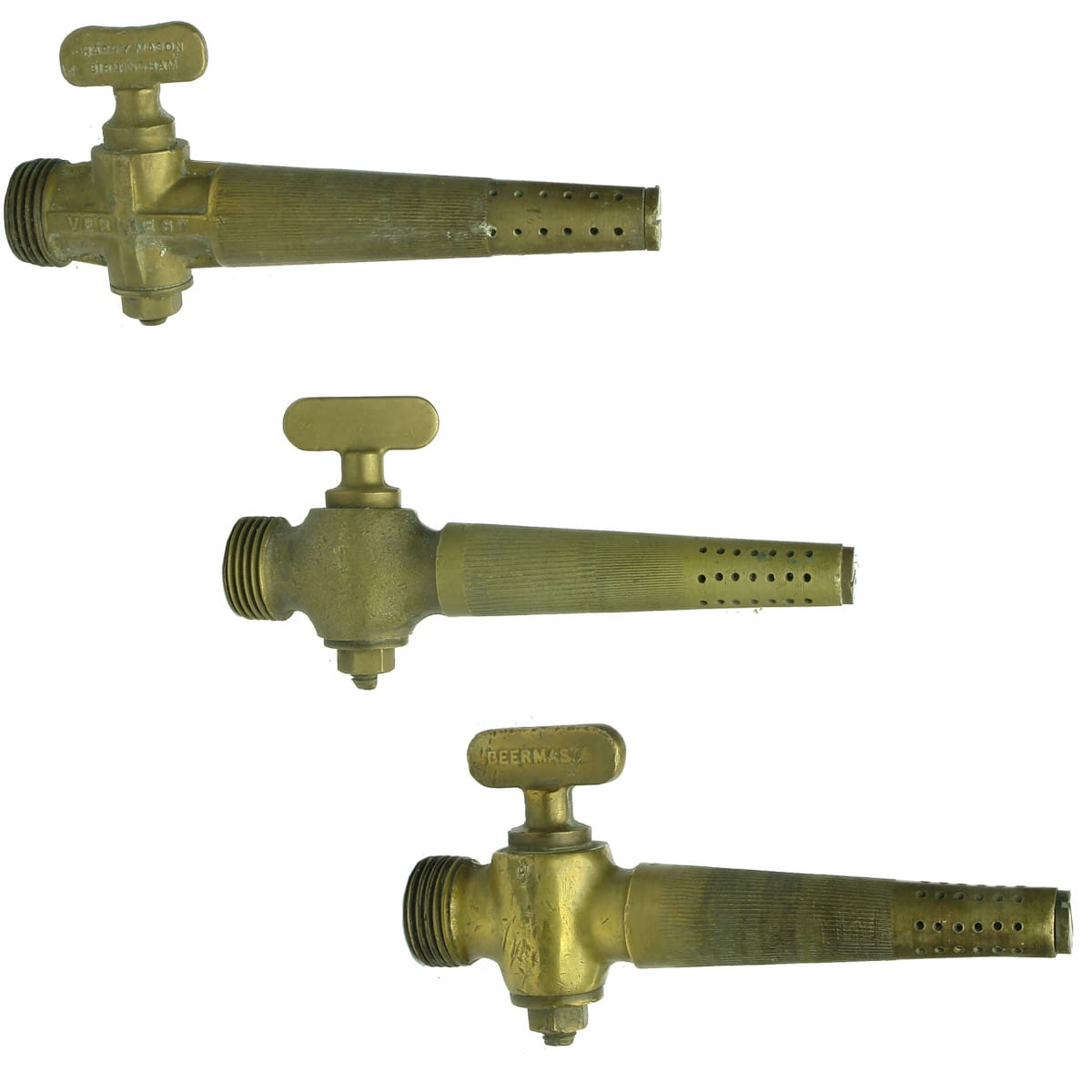 Metalware. Three early brass barrel taps.