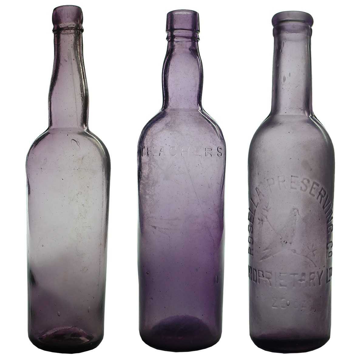 3 large amethyst bottles: Plain Cordial/Whisky etc; Teacher's Whisky; Rosella 26 oz Sauce.