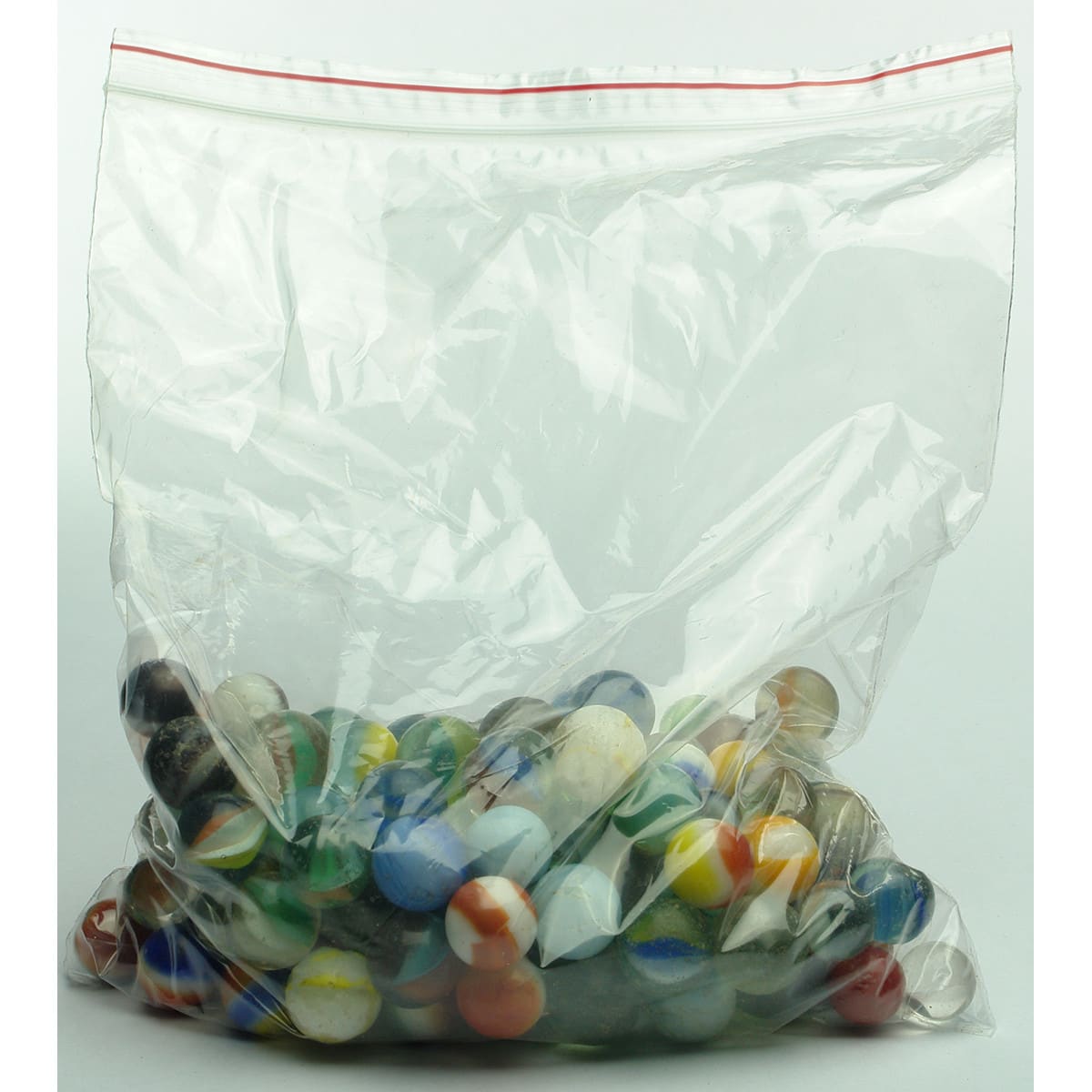 Miscellaneous. Bag of playing marbles.