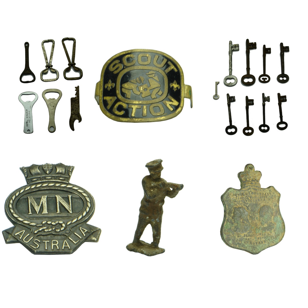 A bunch of metal items. 6 x crown seal openers; Scout badge; 9 antique keys; Merchant Navy badge; Lead Soldier; 1901 Federal Parliament Medallion.