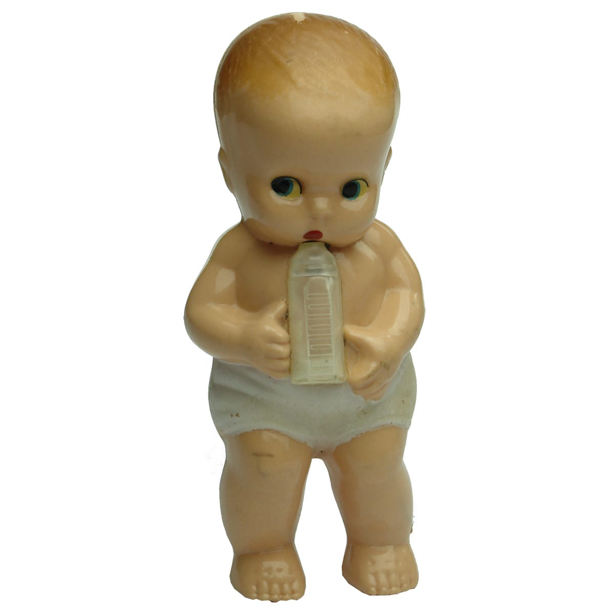 Dolls. Early plastic doll with feeding bottle which fills and empties when inverted.