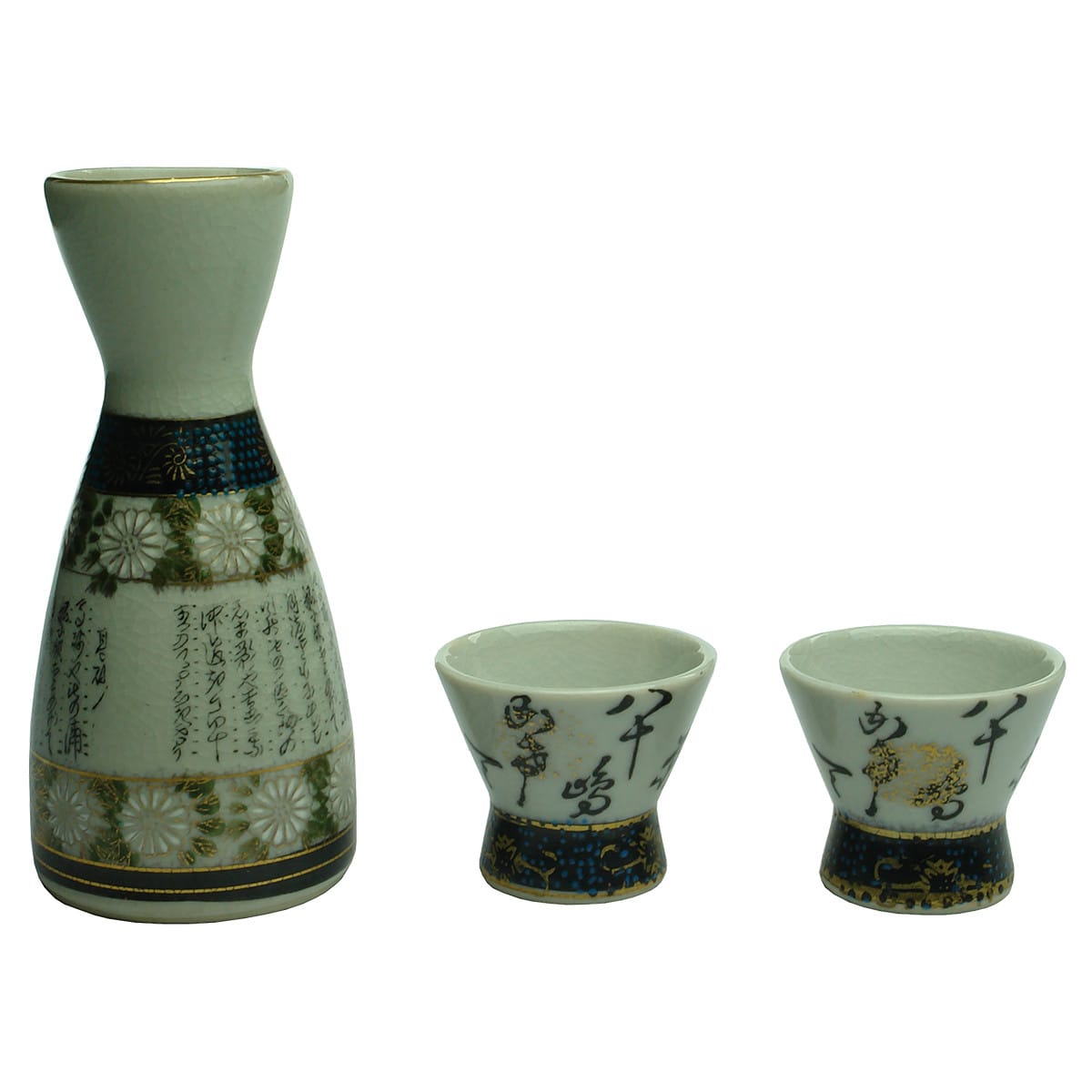 3 piece Japanese Sake Set. Pouring bottle and two small cups. Porcelain with multicoloured decoration and lots of writing.