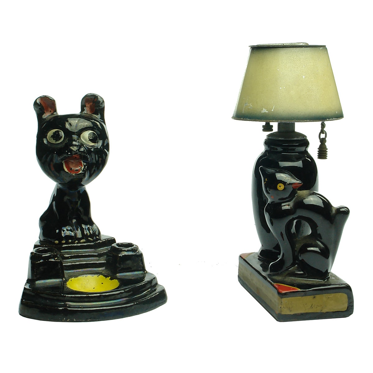 2 Desk items. Both painted pottery of Cat next to a Lamp (Cigarette Lighter) and a Sitting Dog (Inkwell)