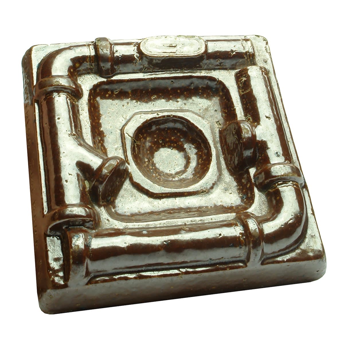 Stoneware Ashtray. Pattern of Pipes and a Sink on top. Waterloo Fire Brick Co. (Sydney, Australia)