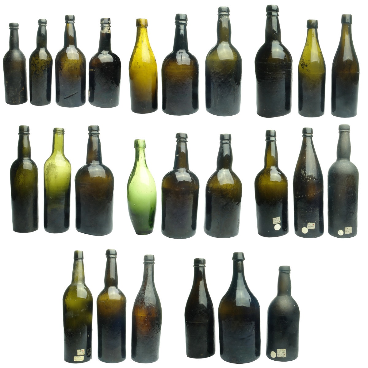 25 Plain "Goldfields" Black bottles. Some with collectors notes where found dated 1971 to 1973. Includes a Machen beer shape but no visible embossing on base.