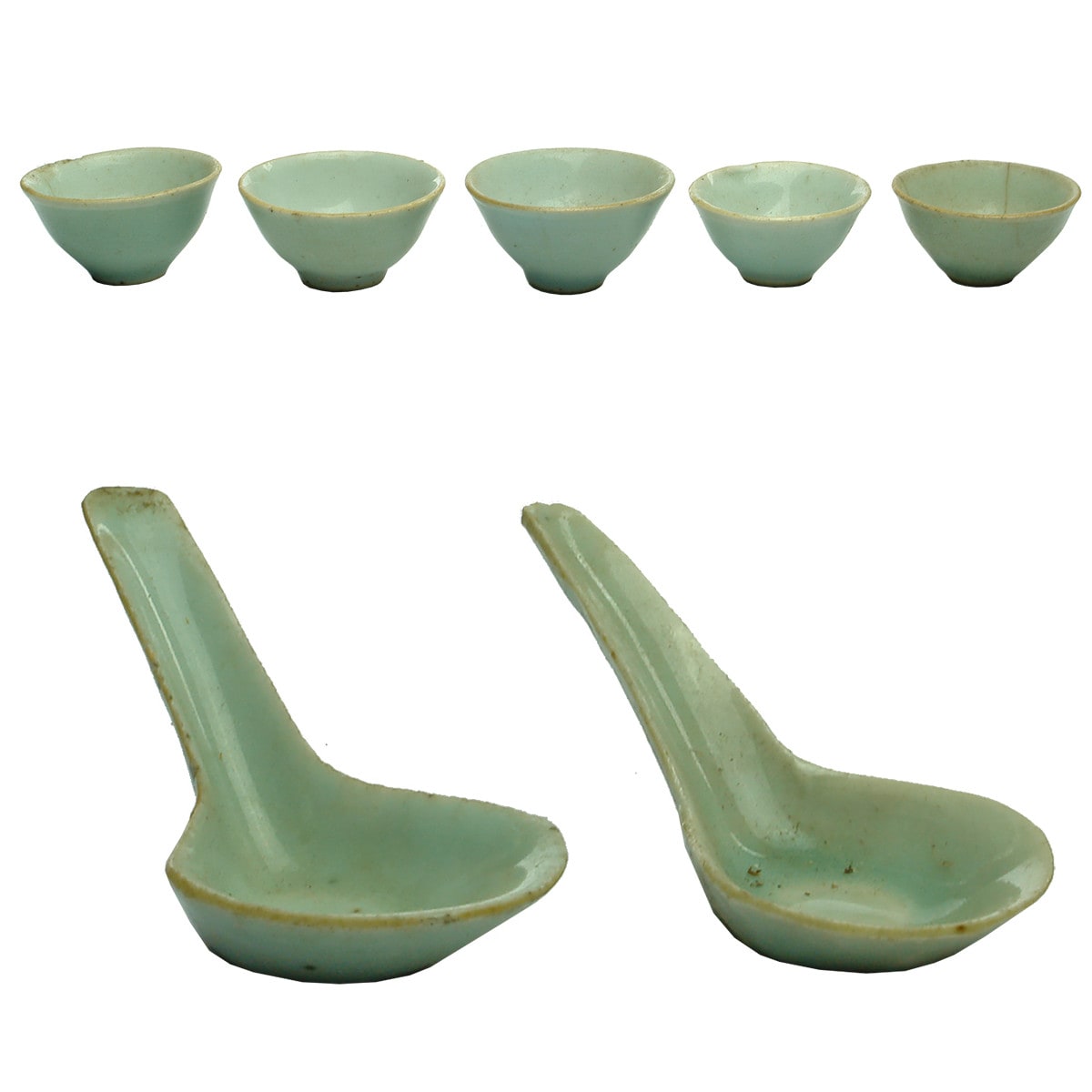 Seven Chinese Items: Five little blue finger bowls, pair of soup spoons.