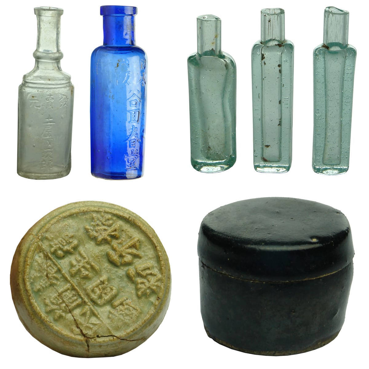 7 Chinese Items. 1. Ovoid clear bottle with fancy neck, characters down the front. 2-4. Opium Vials. 5. Small Pot Lid with Embossed Characters. 6. Small blue cylinder. 7. Small lidded container.