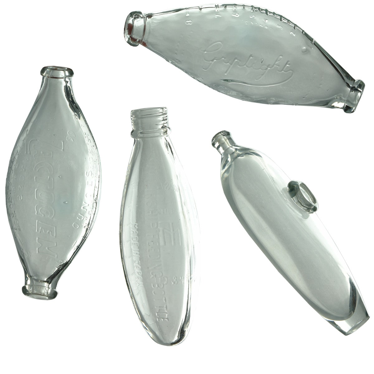 4 Baby Feeders: Lactogen; Griptight; Airship Feeding Bottle; Plain boat shape feeder.