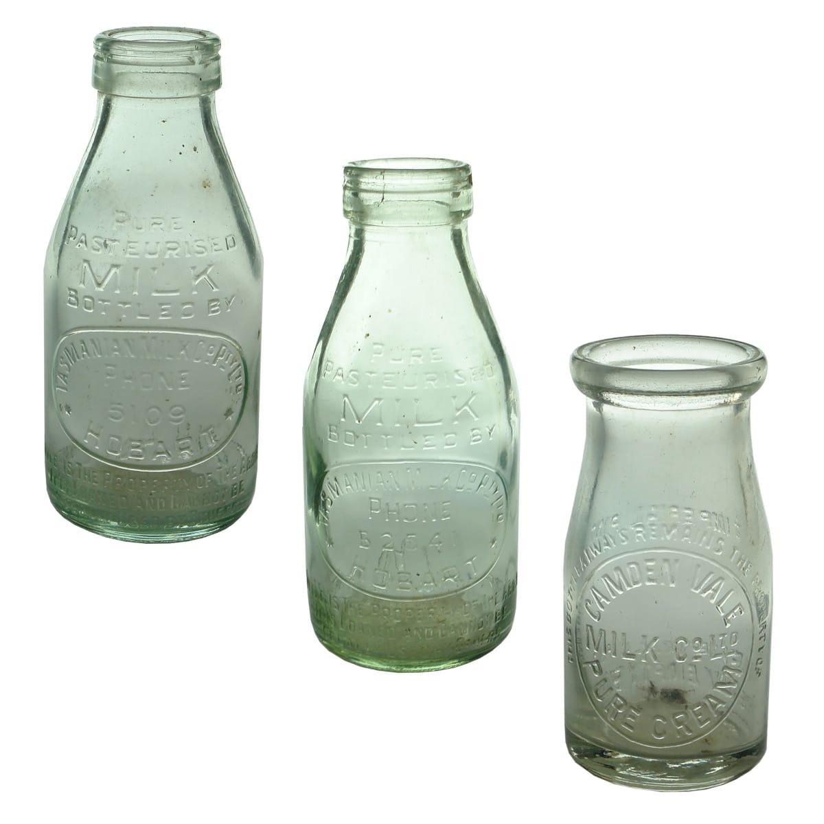 3 Milk & Cream bottles: 2 x Tasmanian Milk Co 1/2 Pints and 1 x Camden Vale 1/4 Pint. (Tasmania & New South Wales)