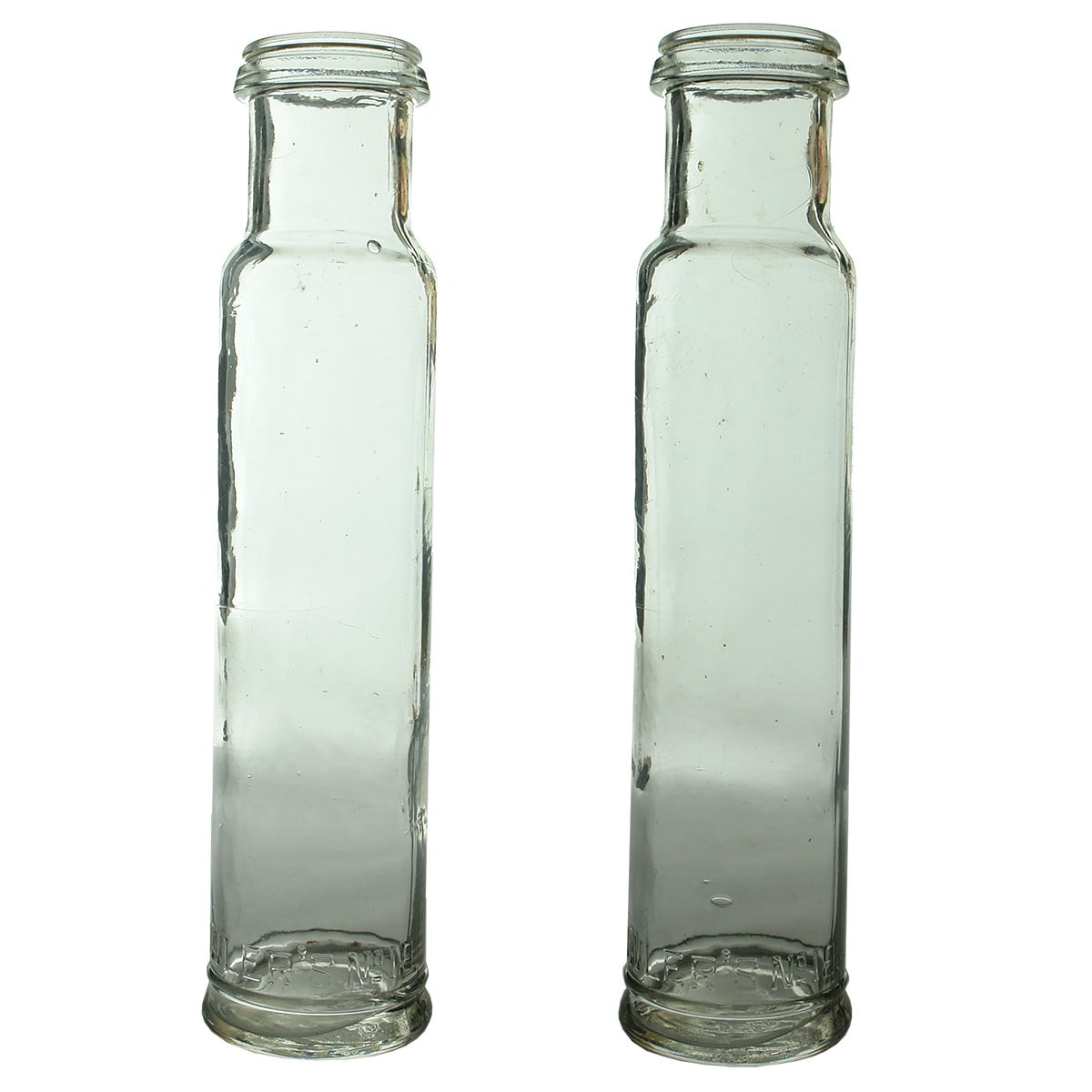 Pair of Fowler's No 19 Tall Skinny Jars.