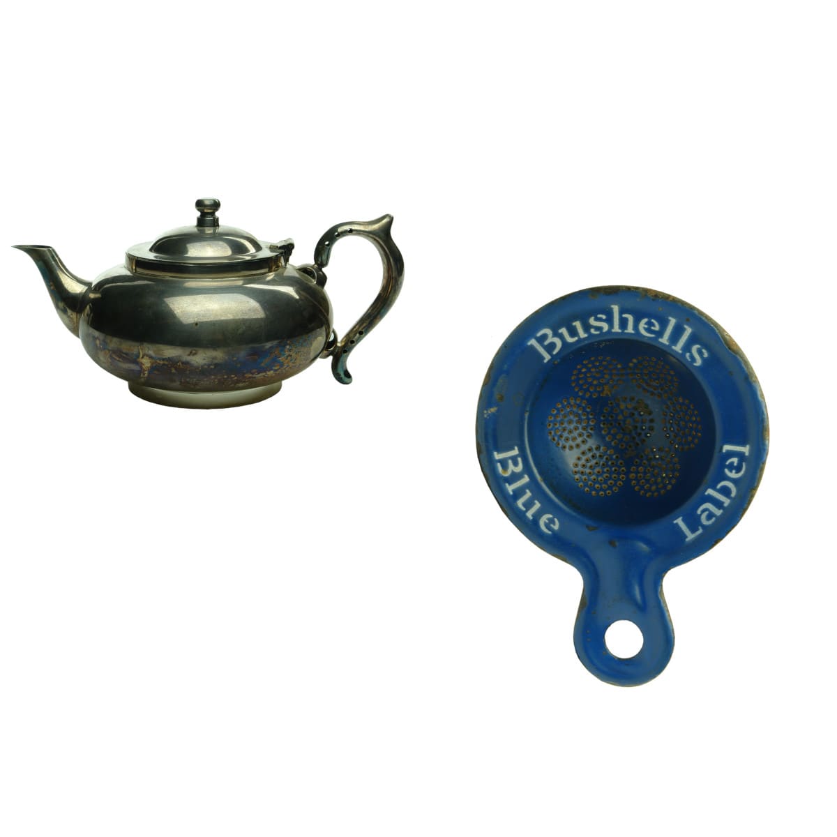 2 Tea Items: EPNS Robur Perfect Teapot; Bushell's enamel Tea strainer.