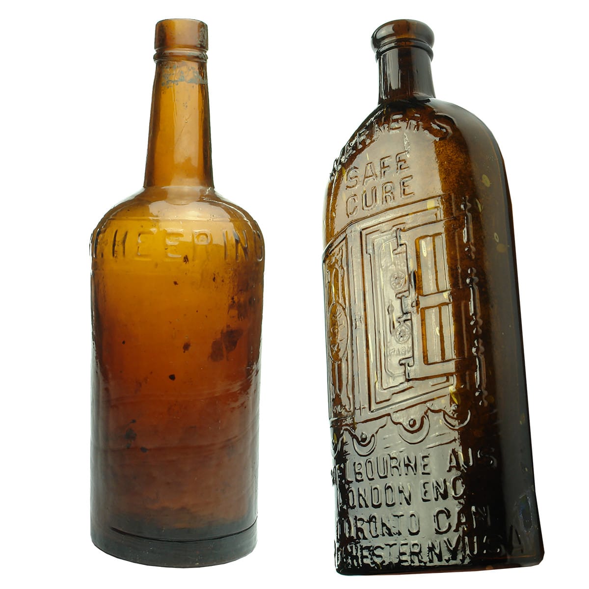 2 Amber glass Bottles. P. F. Heering (Cherry Brandy) and a Warner's Safe Cure Four Cities.