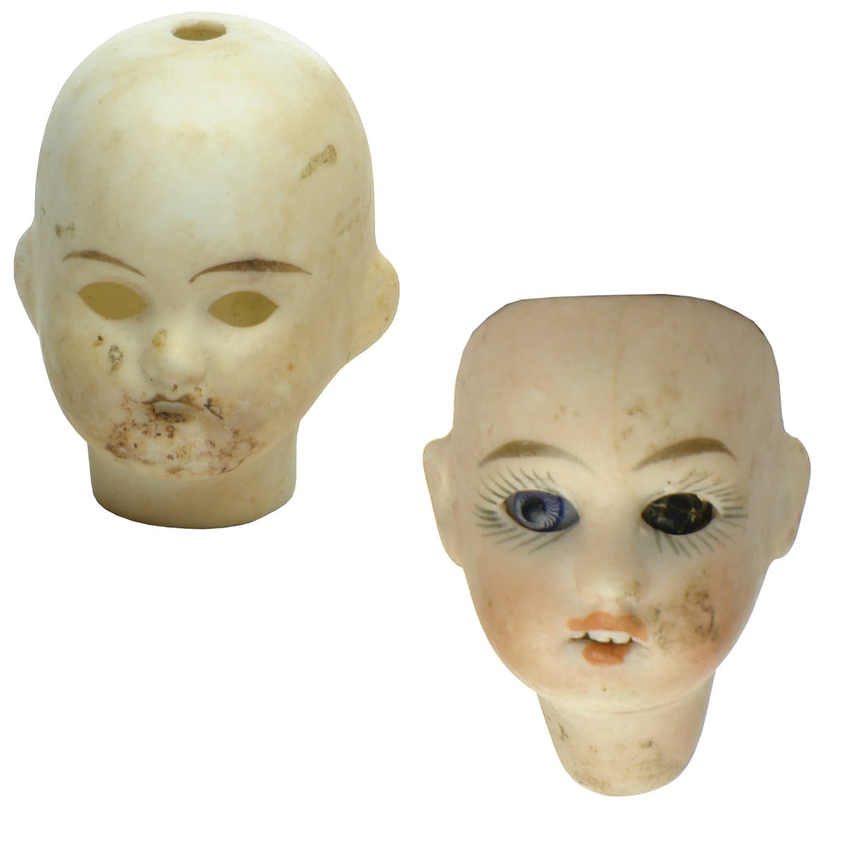 Dolls. Pair of small bisque doll's heads.