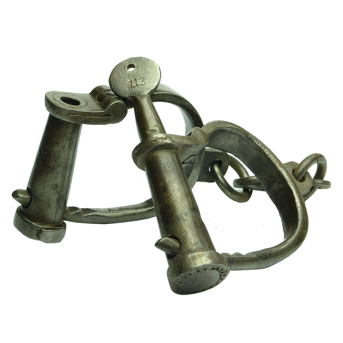 Pair of heavy metal handcuffs with key. Key & cuffs both marked 113.