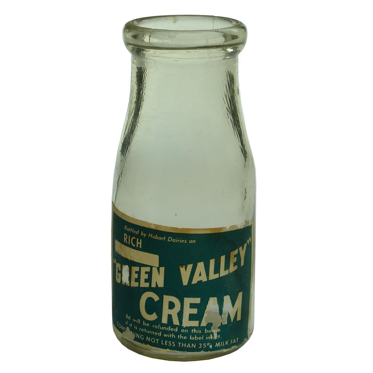 Milk. Labelled Green Valley Cream, bottled by Hobart Dairies. Wad Lip. Clear. 1/2 Pint. (Tasmania)