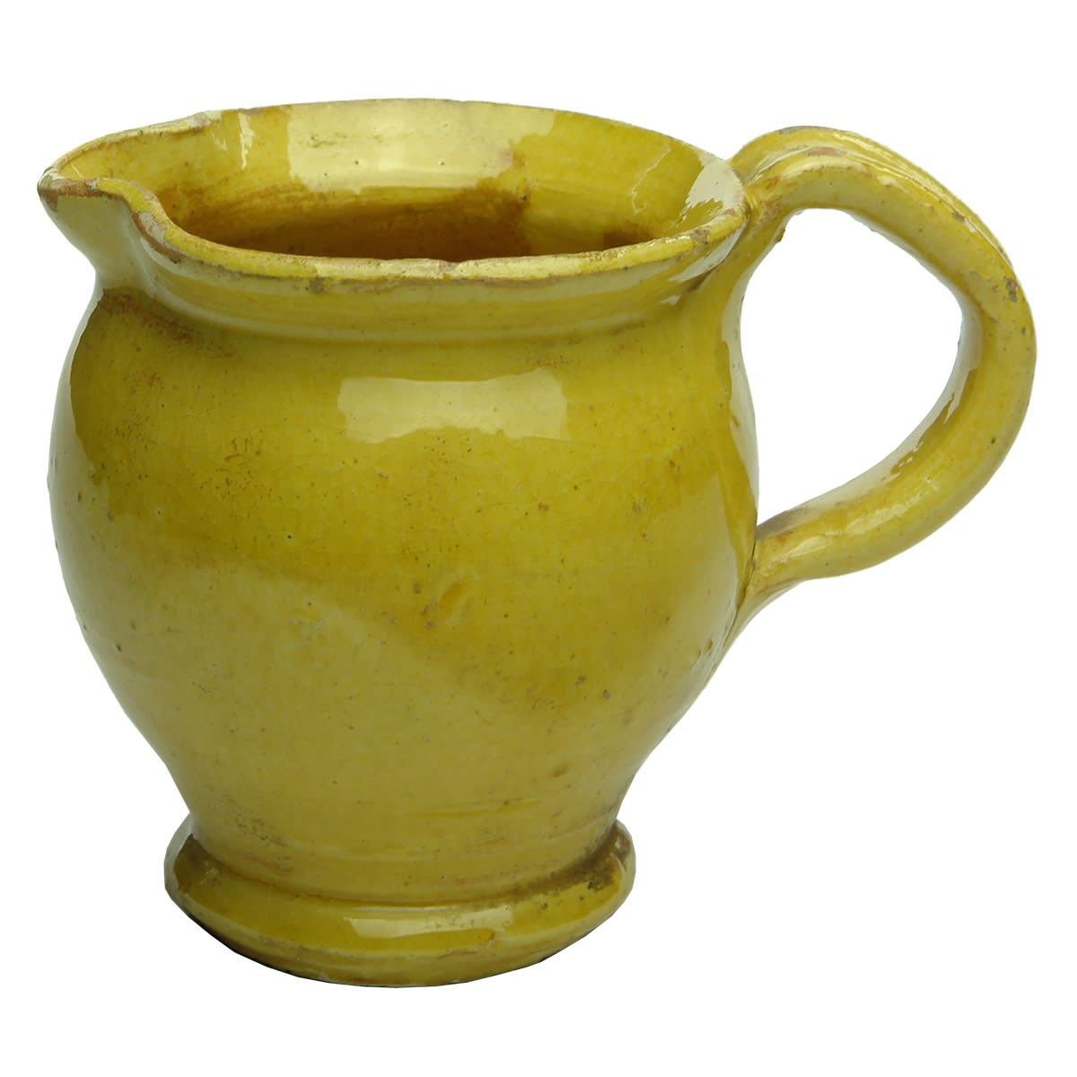 Small yellow glazed jug. Very early looking piece.