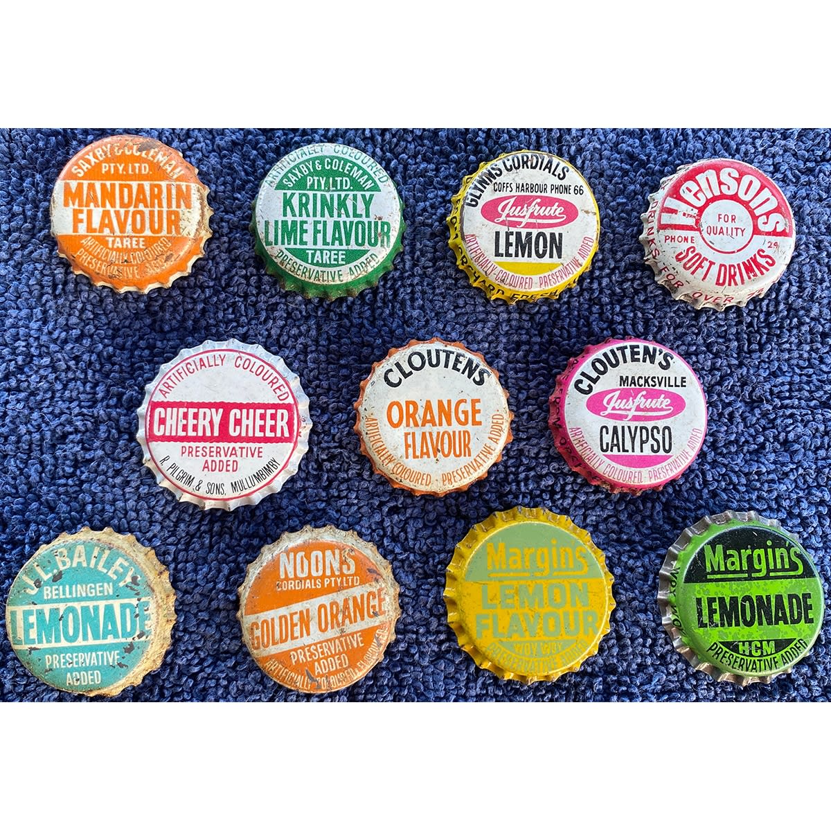 11 NSW Soft Drink Crown Seal Caps: Saxby & Coleman x 2; Glynns Cordials; R. Pilgrim & Sons; 2 x Cloutens; Hensons; J. L. Bailey; Noon's; Margin's. (New South Wales)