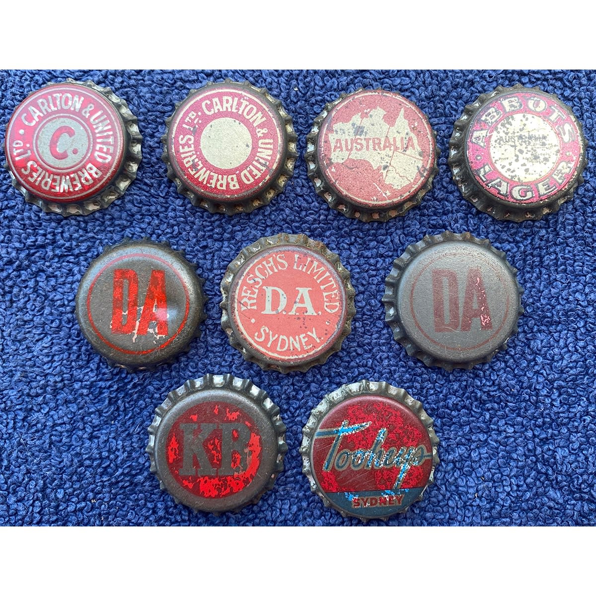 9 Beer Crown Seal Caps: Abbots Lager; Australia; 2 x Carlton & United Breweries; 2 x DA; Resch's Limited DA; Tooheys; KB. (Victoria & New South Wales)