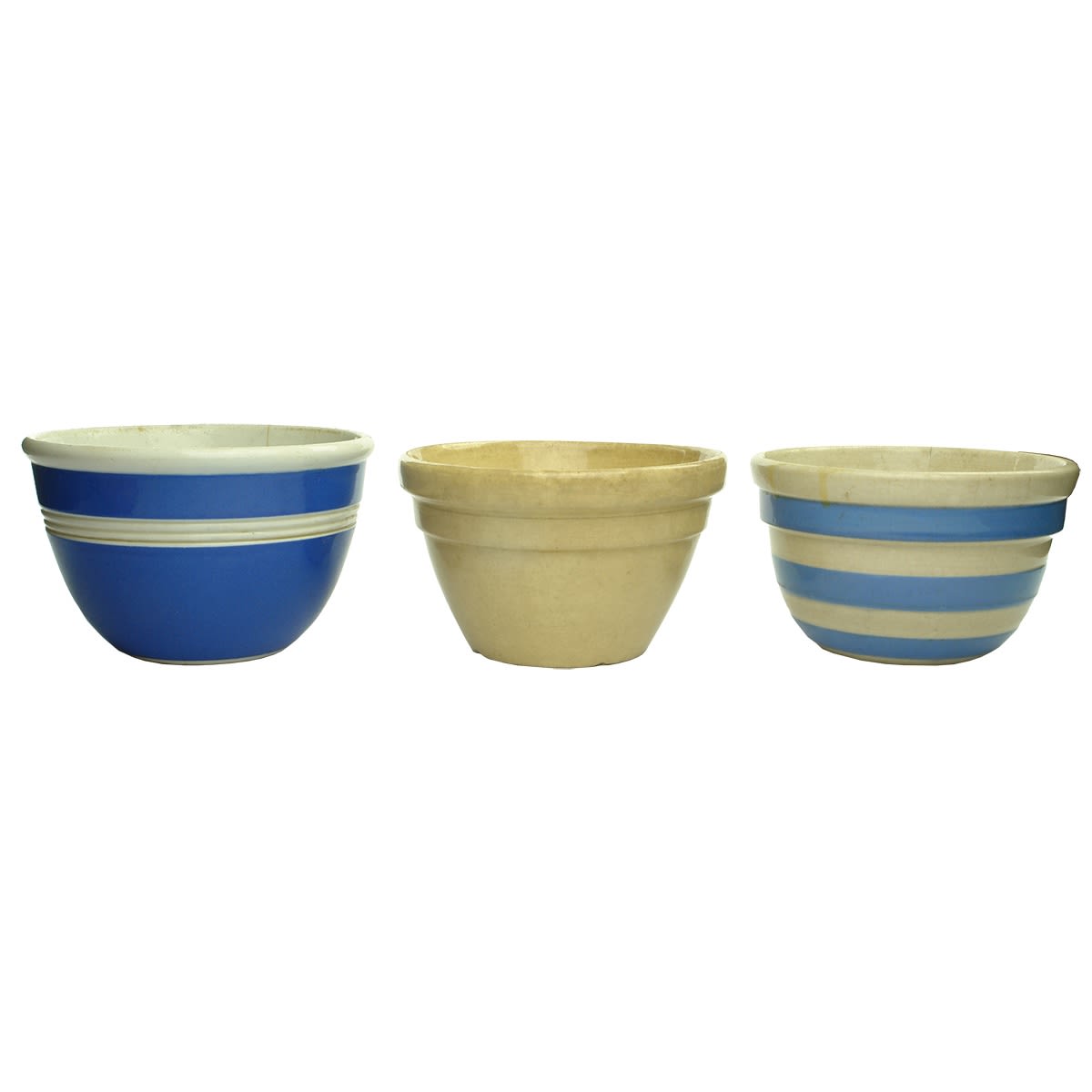 Pottery. Three Pudding Bowls: Blue and White R. Fowler, Australia, Fowlerware; Cream Coloured Hoffman, Australia; Blue and White Banded Unmarked Pudding Bowl. (Victoria)