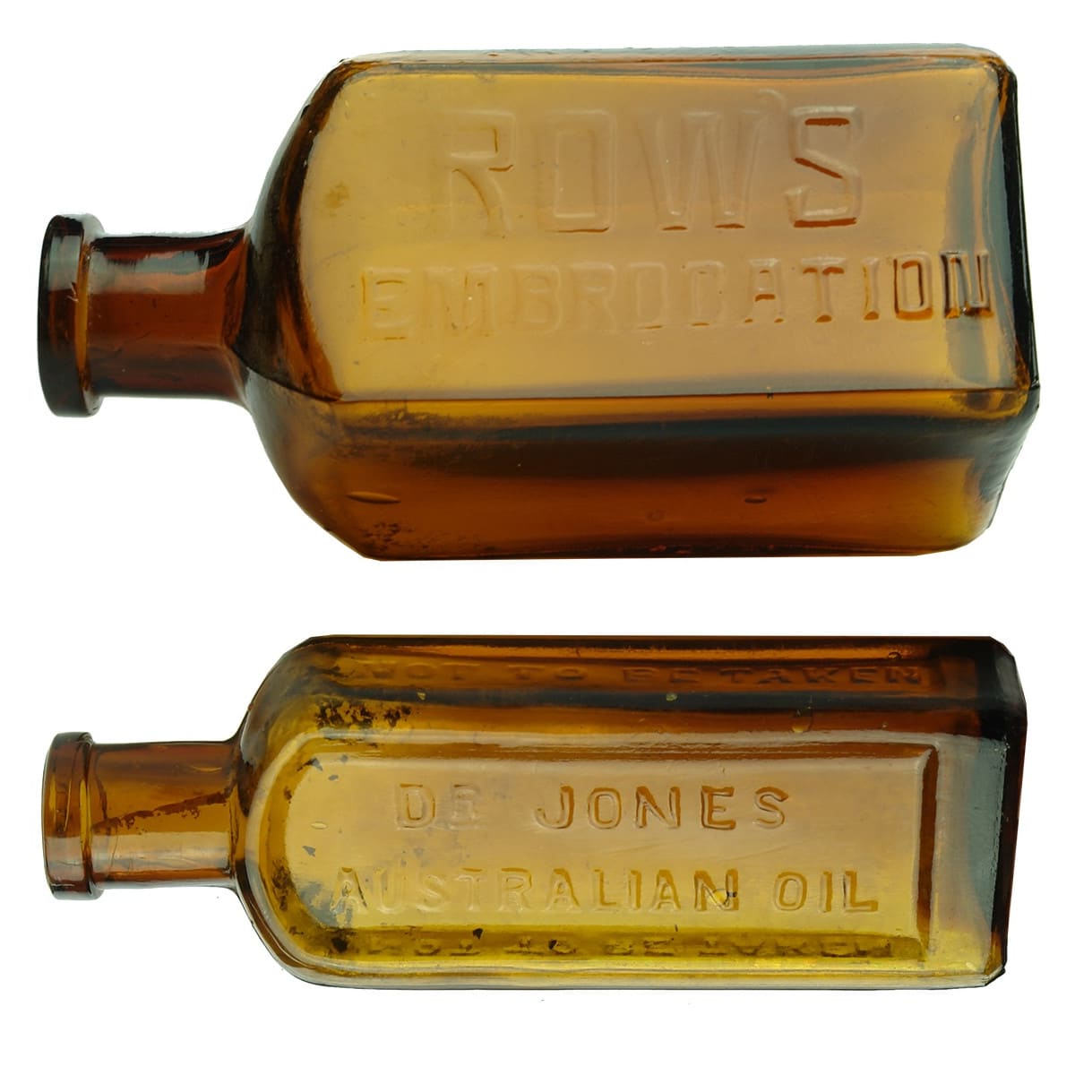 2 Amber glass Bottles: Rows Emrocation and Dr Jones' Australian Oil.