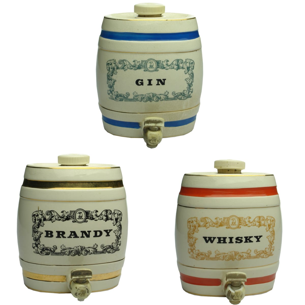 3 Spirits Barrels. W & A Gilbey Limited, Gin, Brandy and Whisky. Royal Victoria Pottery, Wade, England. Small ceramic barrels.