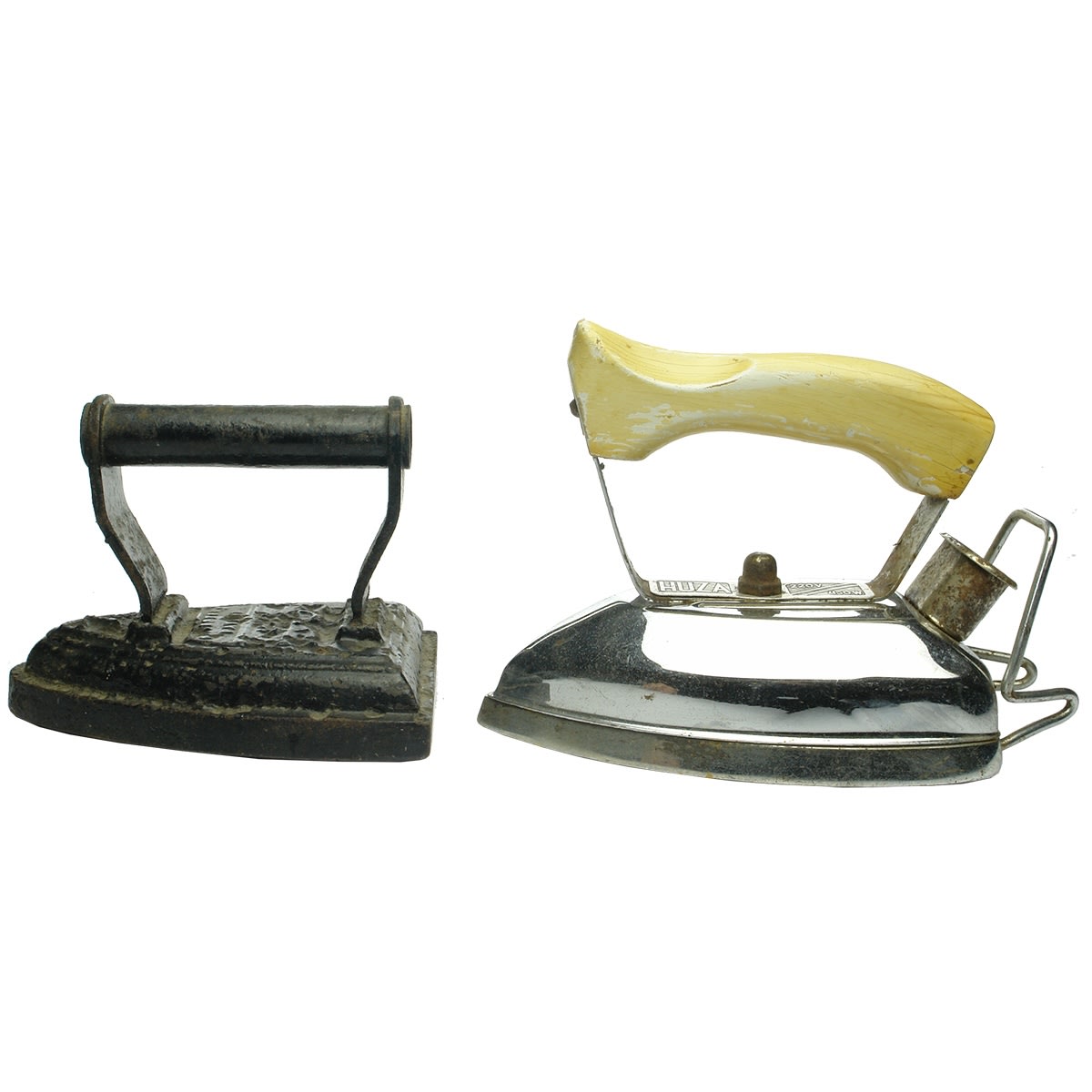 Metalware. Pair of irons: 1. Silvester's Patent No 7 Cast Iron Flat Iron. 2. Early Huza Electric Iron.