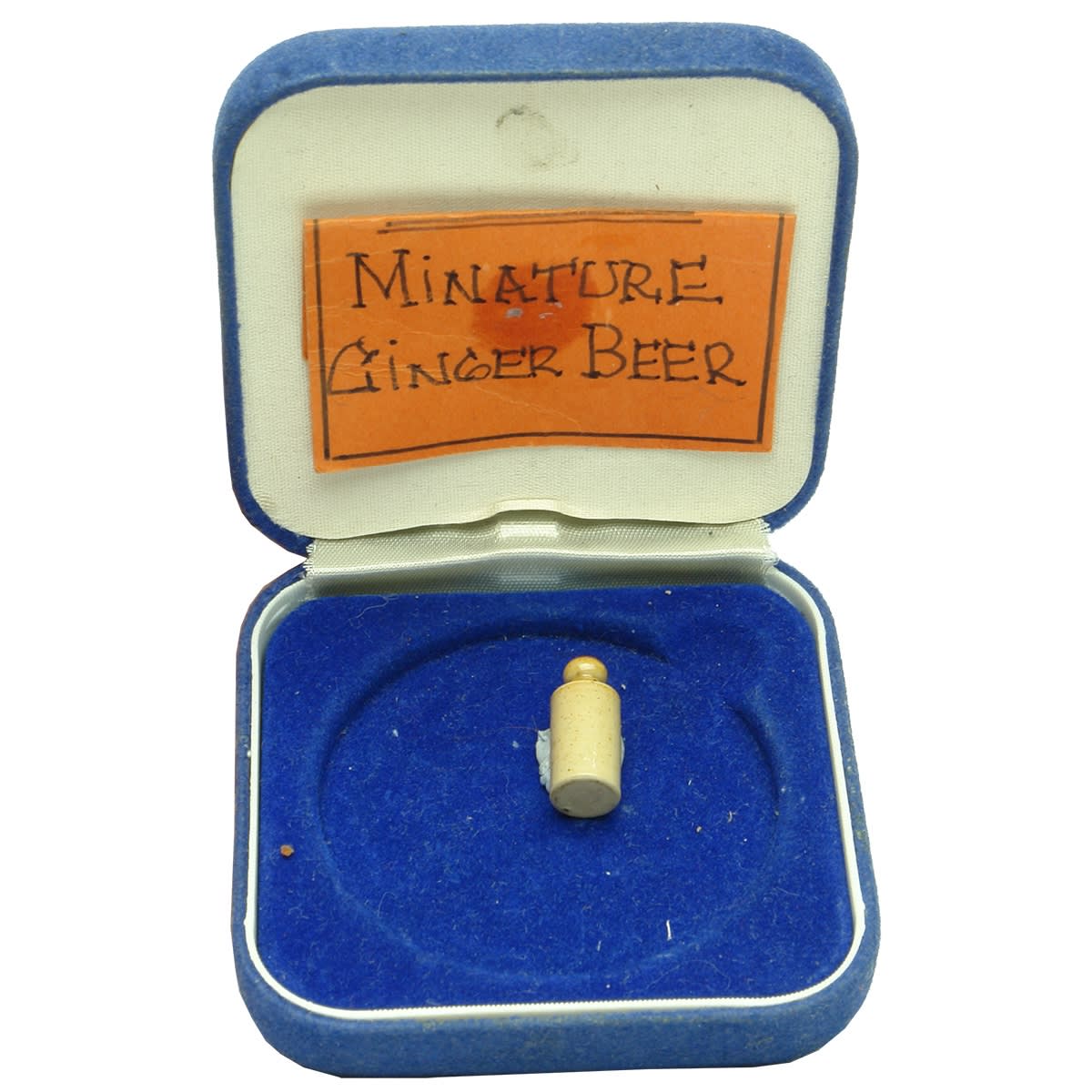 Miniature Ginger Beer. Looks like that Orangey Doulton Glaze. Only 19 mm tall!