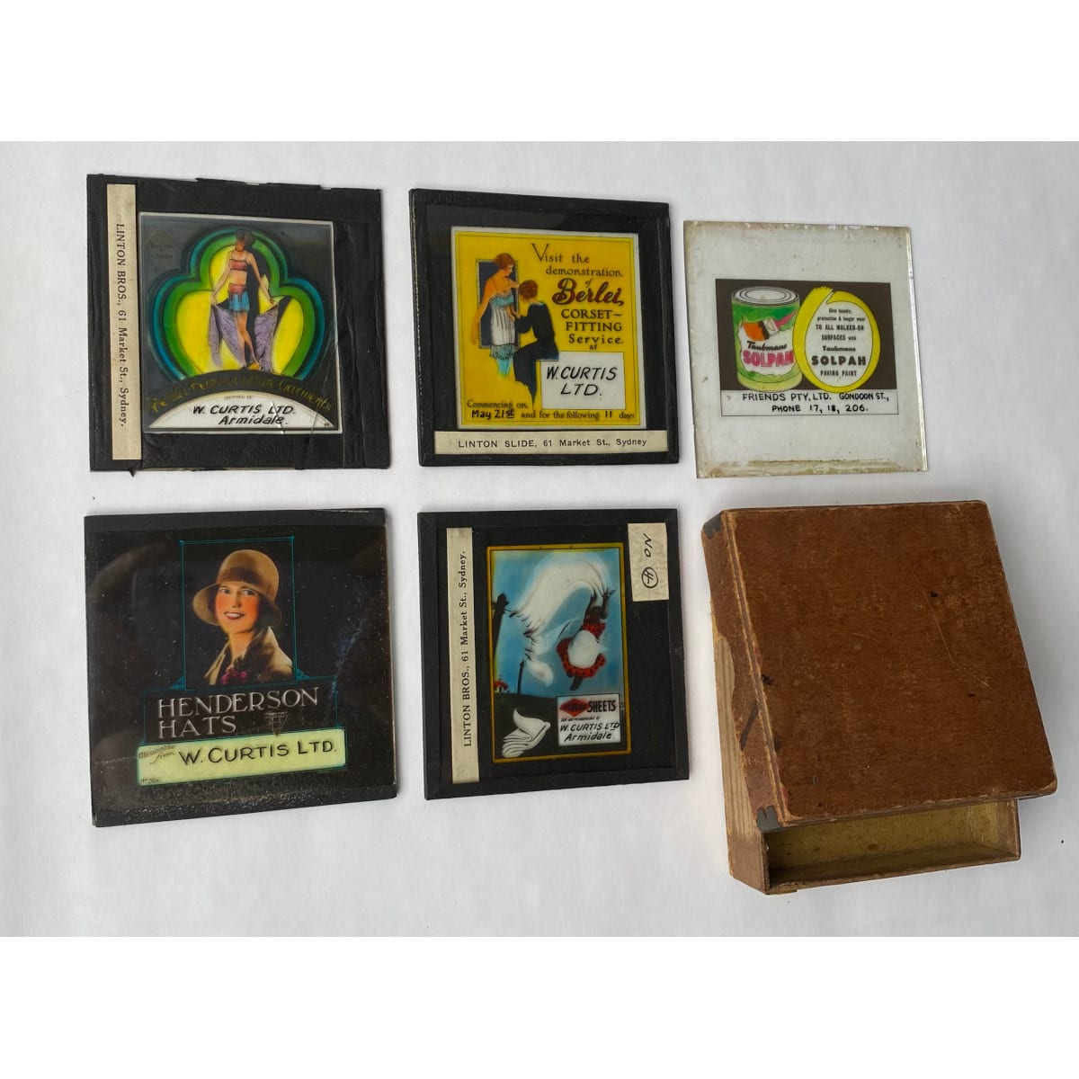 Movie Advertising: 5 Glass Slides, 4 x W. Curtis Ltd Armidale - Berlei, Osman Sheets, Henderson Hats 1 x Friends Pty Ltd Gondoon St (Gladstone QLD) Pencil from Charles E. Blanks, Sydney.