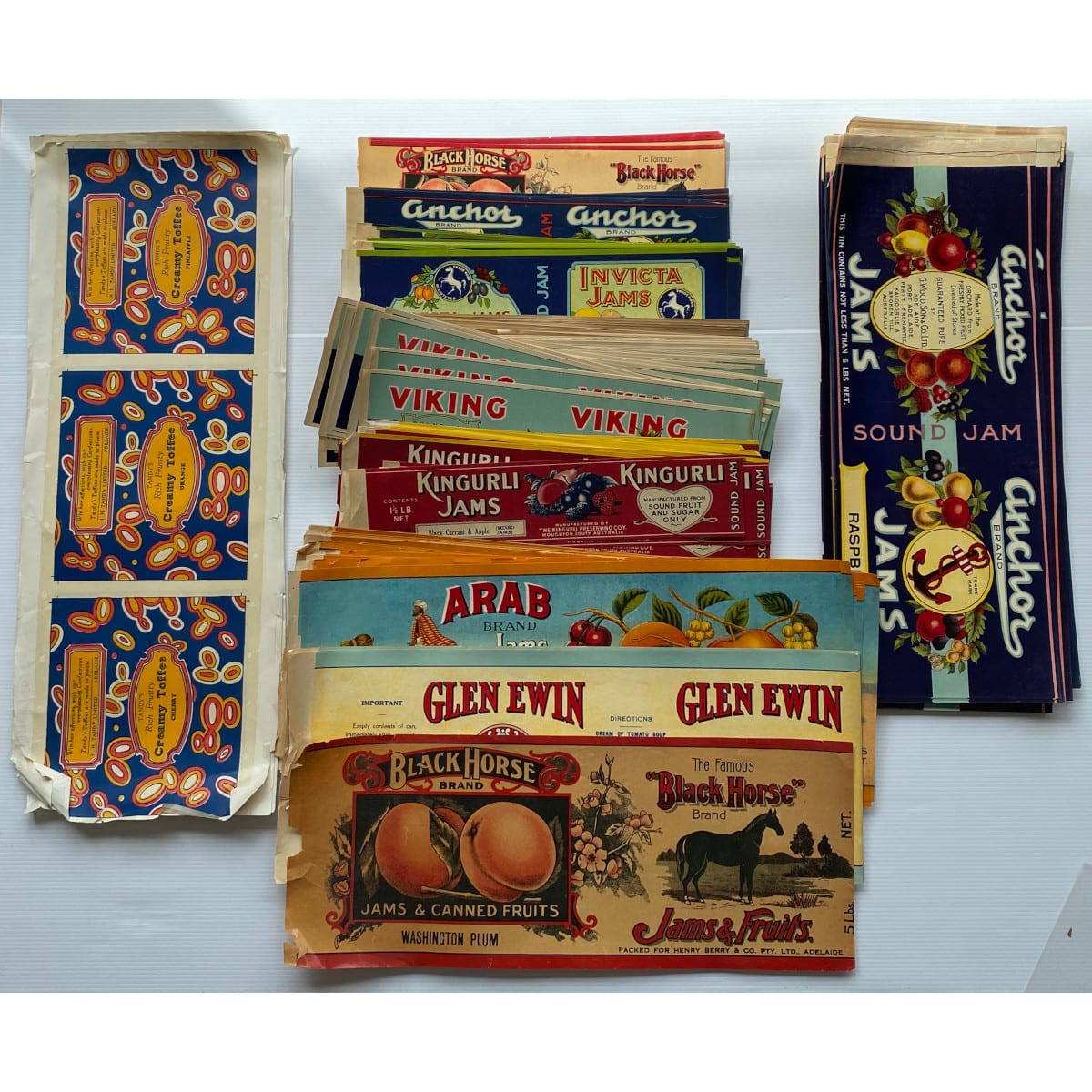 Large group of Jam tin labels: Kingurli, Viking, Houghton Henry Berry Invicta & Black Horse Wood & Son Anchor Glen Ewin Wilkinson Arab And a few Tandy's Toffees. (South Australia)