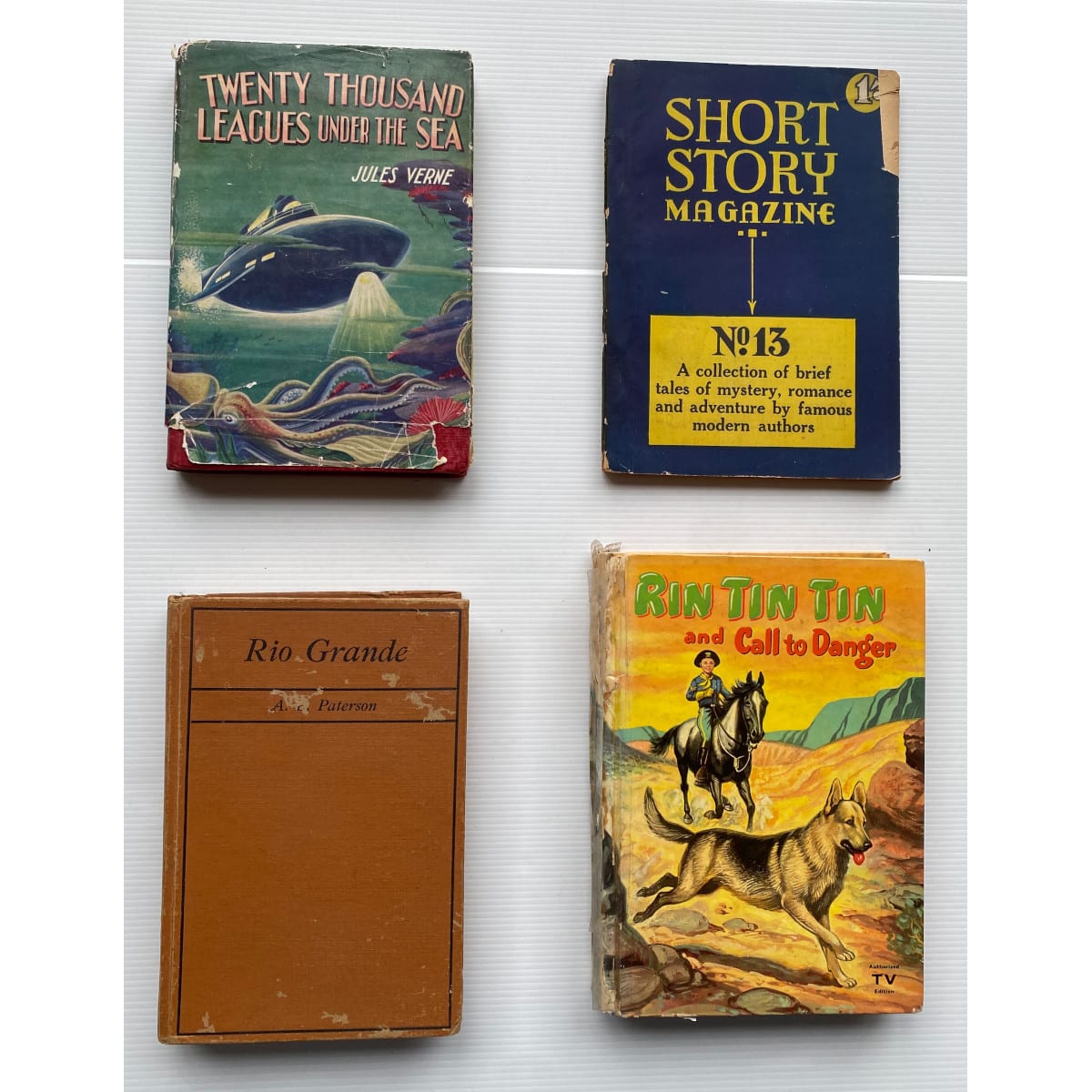 4 Books: Twenty Thousand Leagues under the Sea, Jules Verne Short Story Magazine No 13 Rin Tin Tin and Call to Danger Rio Grande, Banjo Patterson.