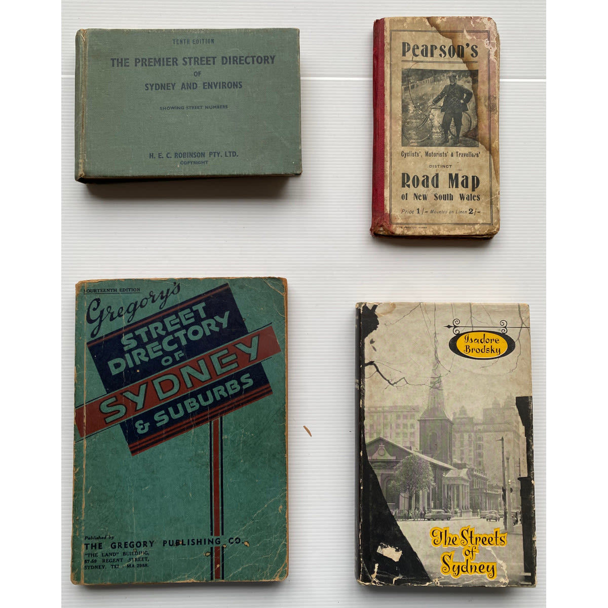 4 Books: Premier Street Directory of Sydney 1946 Pearson's Road Map of NSW (Early 1900s) Gregory's Street Directory of Sydney Fourteenth Edition The Streets of Sydney, Isadore Brodsky.