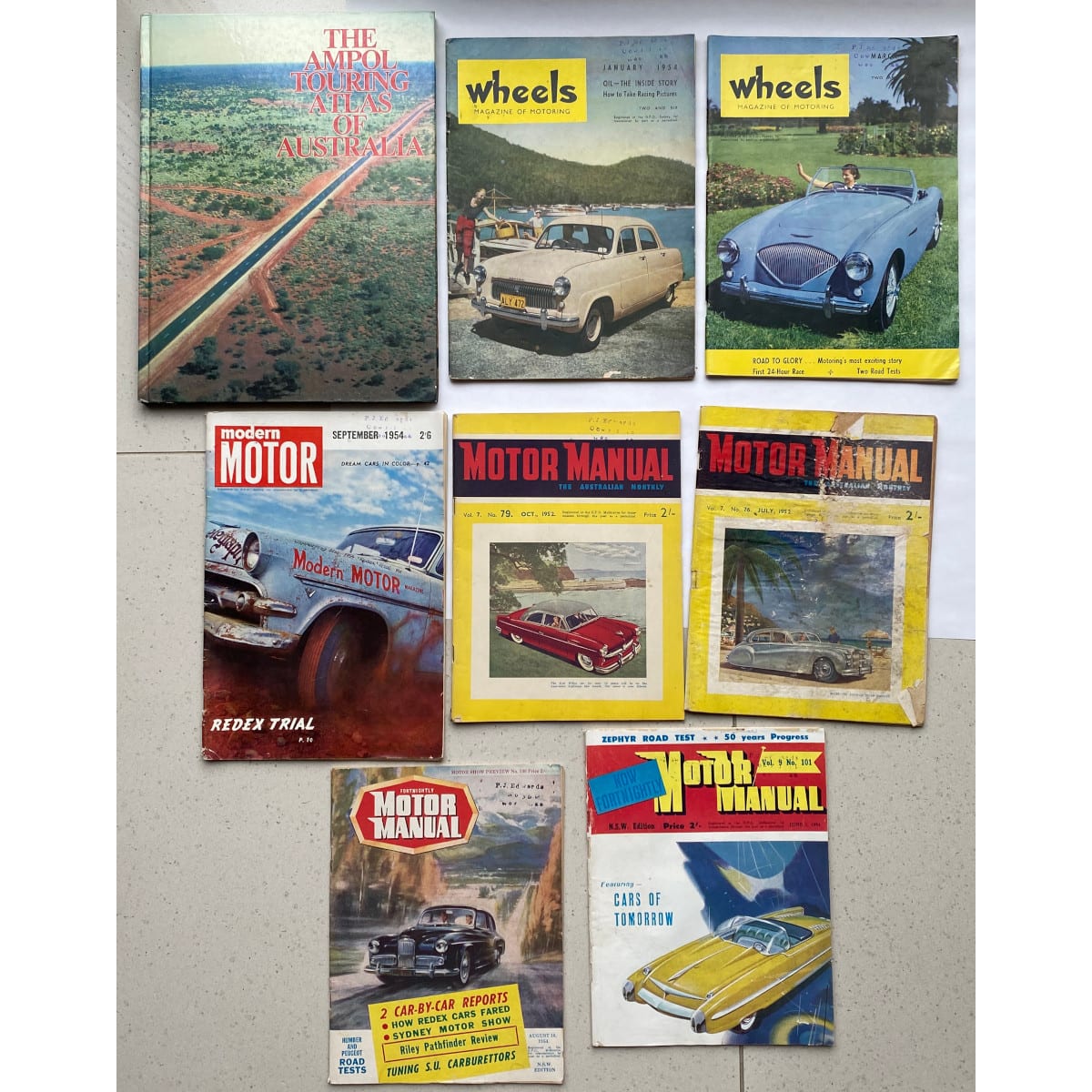 8 Magazines/Book: Ampol Australia Atlas (1983) 7 different 1950s Motoring Magazines.