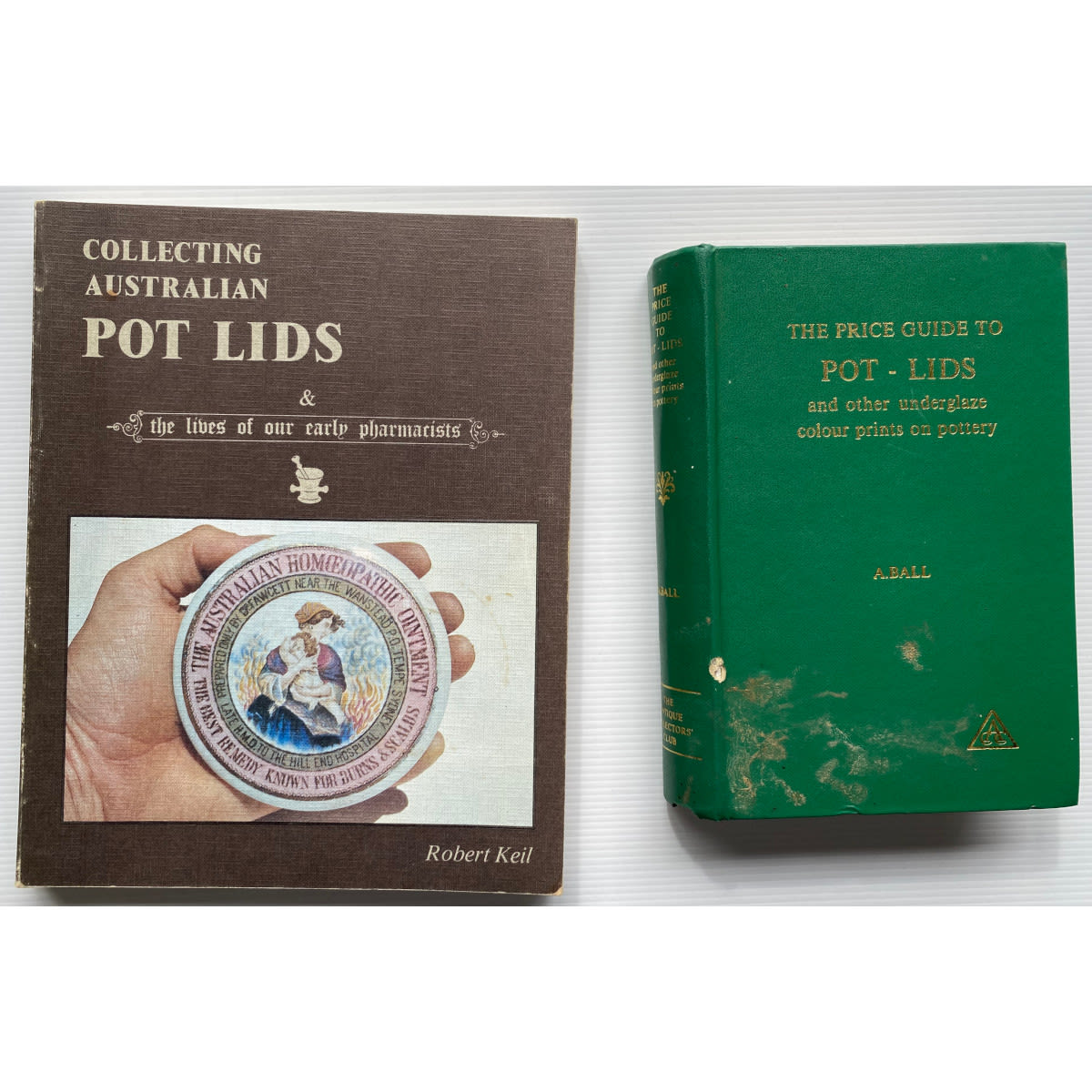 2 Pot Lid Collectors Books: Australian Pot Lids, Robert Keil and The Price Guide to Pot Lids, A. Ball.